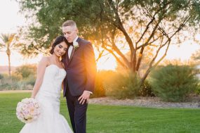Phoenix wedding photograph of bride and groom hugging at sunset