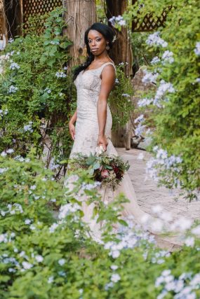 Phoenix wedding photograph of black bride surrounded by flowers