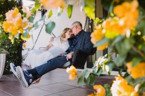 Phoenix wedding photograph of older couple on porch swing