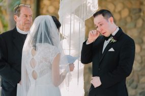 Phoenix wedding photograph of groom crying during ceremony vows