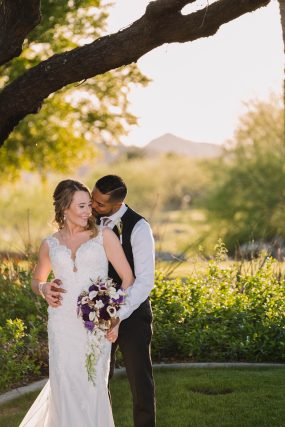 Phoenix wedding photograph of groom kissing bride