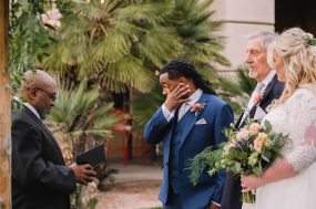 Phoenix wedding photograph of groom crying at ceremony