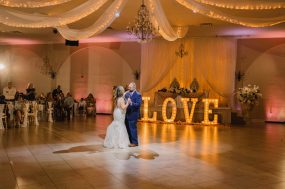 Phoenix wedding photograph of first dance with love sign