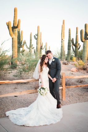 Phoenix wedding photograph of bride and groom with cactus