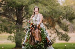 Phoenix wedding photograph of bride riding on horse