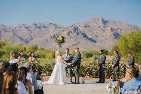 Phoenix wedding photography of wedding ceremony with mountains